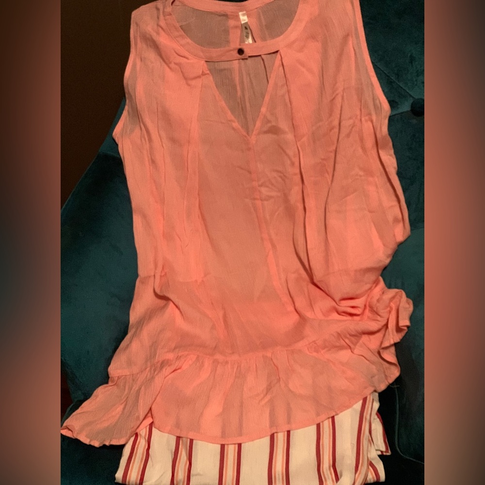 Soft and flowing ruffled hem tunic top